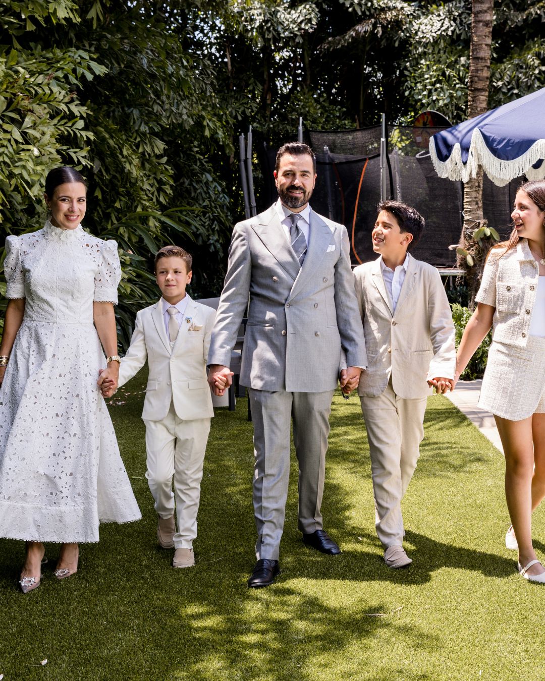 Family walking together, candid garden session