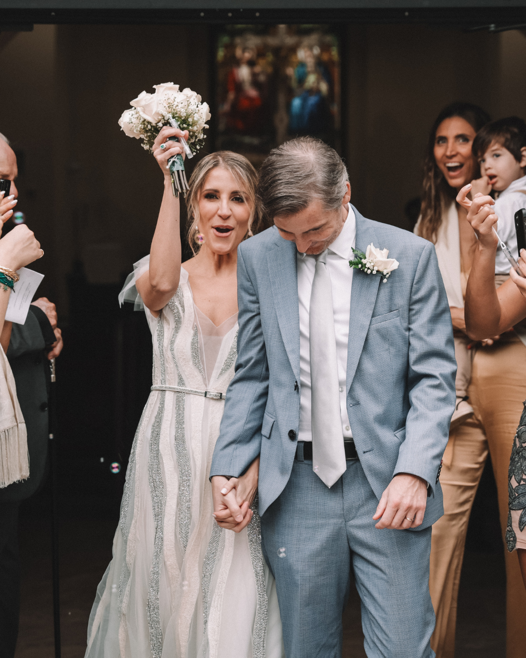Bride and groom celebrating after the ceremony