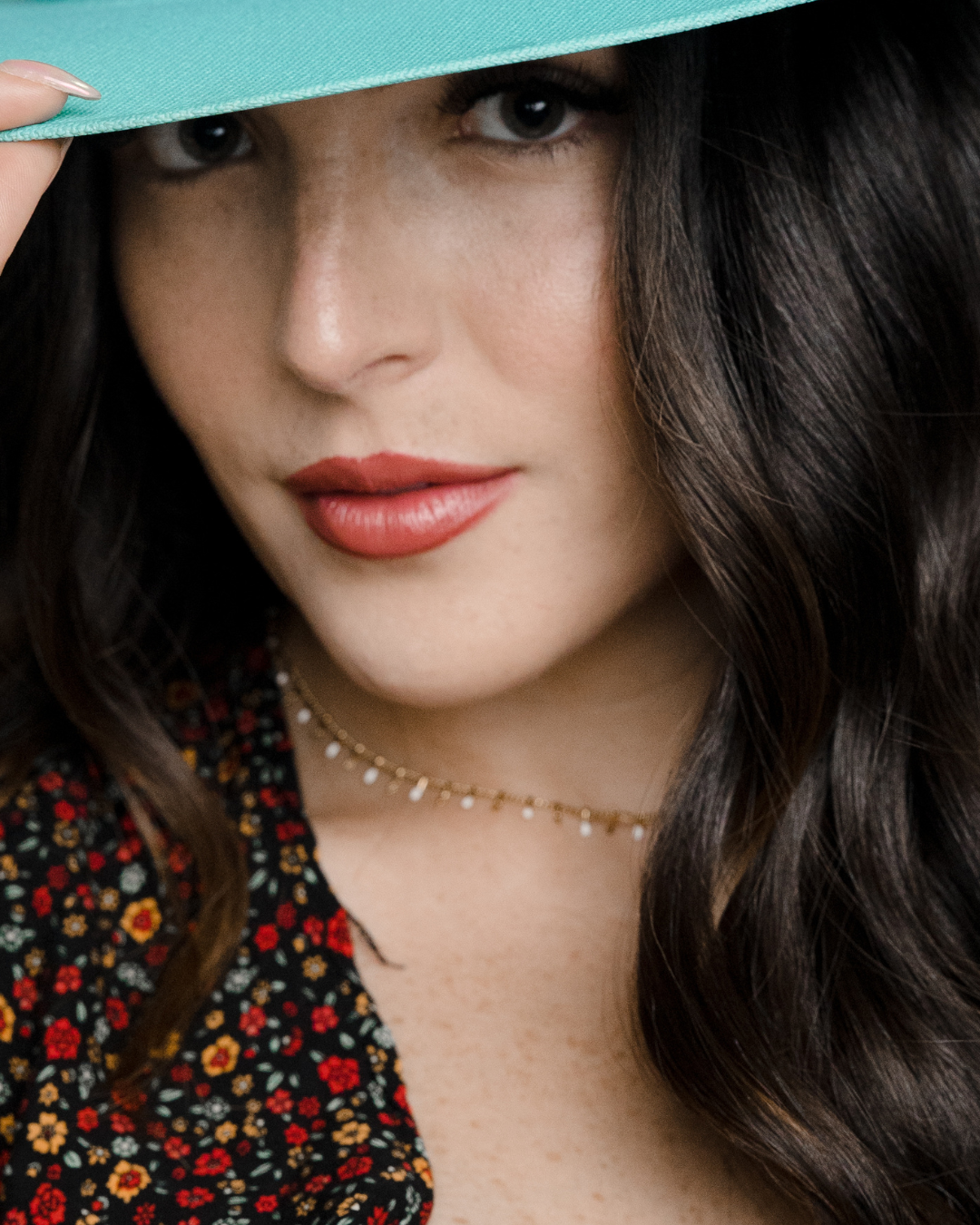Close-up portrait with a wide-brim hat